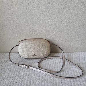 Kate Spade Glimmer Glitter Oval Camera Crossbody Bag in gold
